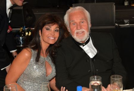 Wanda Miller was a hostess at a restaurant when Kenny Rogers first say her.